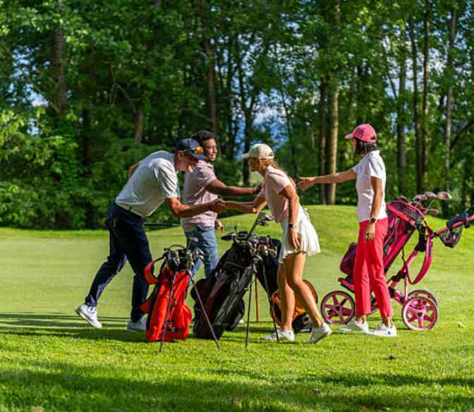 Custom golf bag manufacturers factory floor with multiple bag models in production