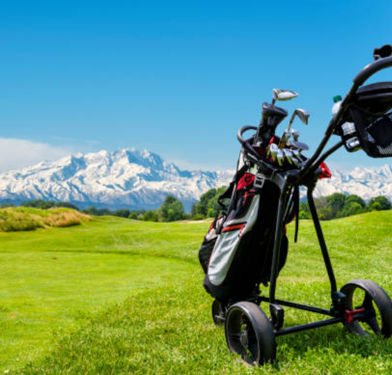 Expert golf bag makers hand-stitching leather details on a premium golf bag