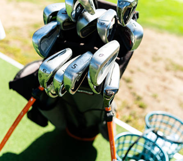 Why Your Brand Needs a Professional Golf Bag Manufacturer: 5 Critical Reasons 1 Professional golf bag manufacturer inspecting club dividers and stand mechanism on production line