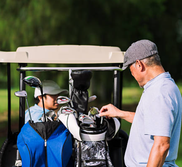 Golf bag quality control inspector checking stitching on a premium stand bag